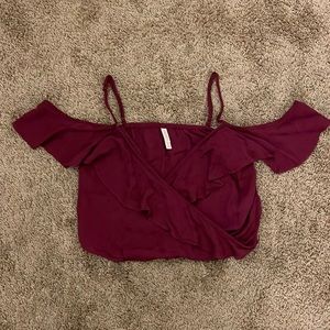 Cropped maroon flowy tank top with draping sleeves
